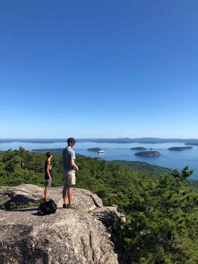 Two of our sons standing at the top of Precipice Trail in Acadia National Park, Maine. This hike is really NO JOKE and you should definitely do your research before hitting the trail with kids or with any limiting physical disabilities.
