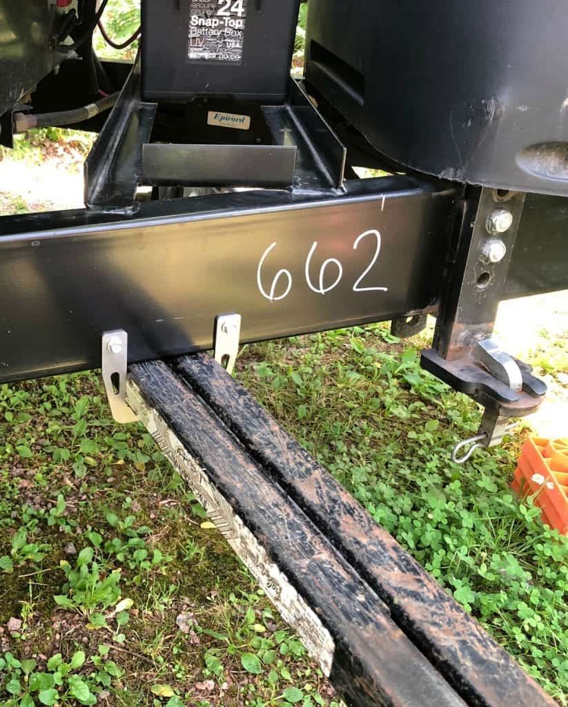 The HITCHPORT Spring Bar Storage Mount is a simple U-shaped bracket that attaches to the tongue of your travel trailer. It keeps your spring bars off of the ground and your back in good shape. That's the perfect combo.