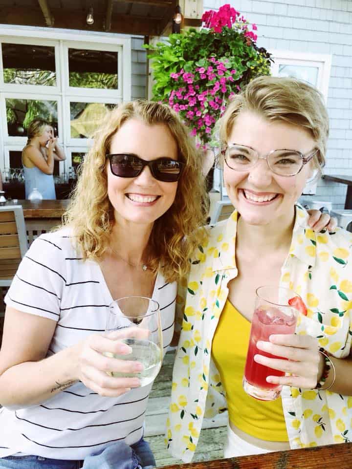 Mother and daughter enjoying an afternoon drink while on an RV road trip