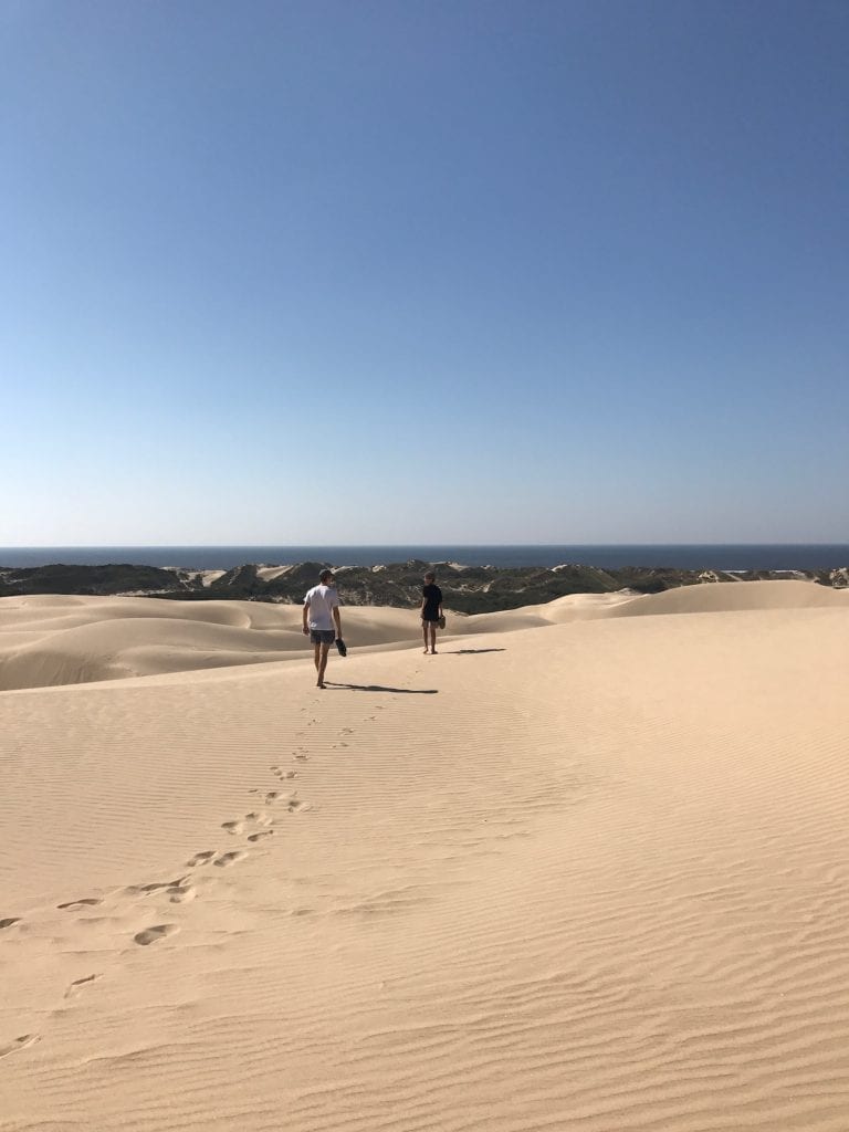Walking the sand dunes at Pismo Beach, California