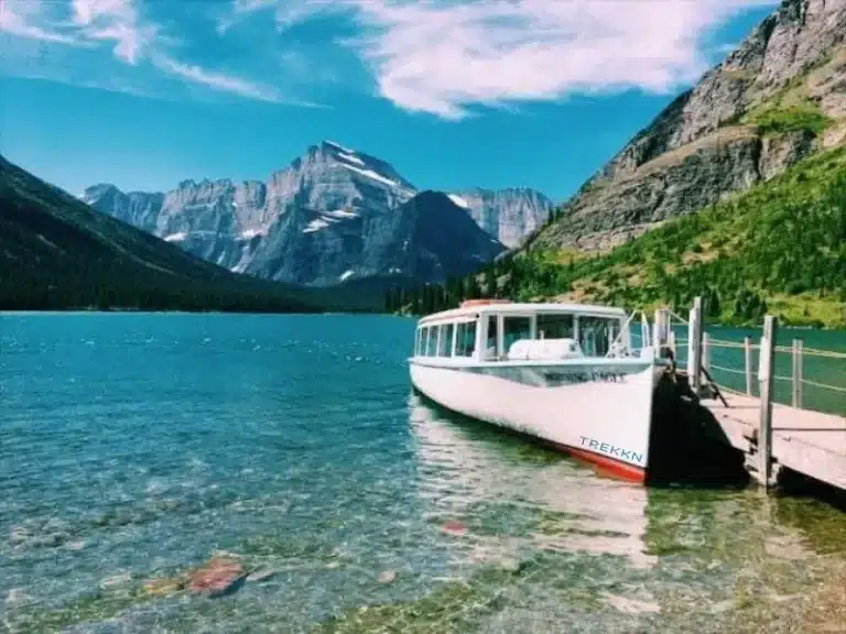 Boat docked on lake near Glacier National Park.