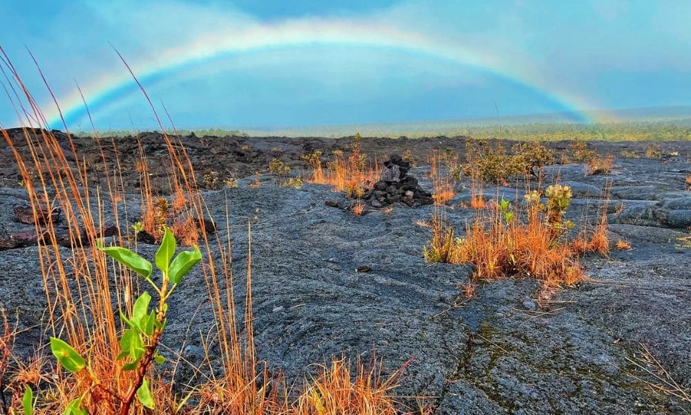 stunning rainbow in hawaii volcanoes national park