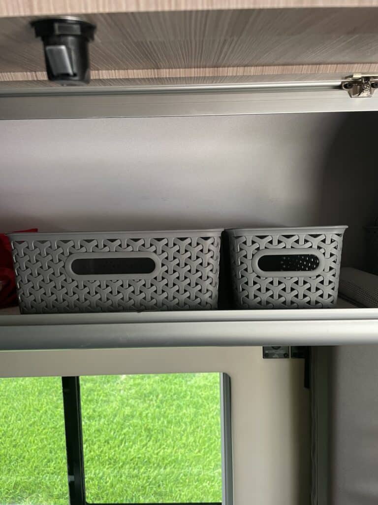 Small baskets inside camper van great for organization while traveling