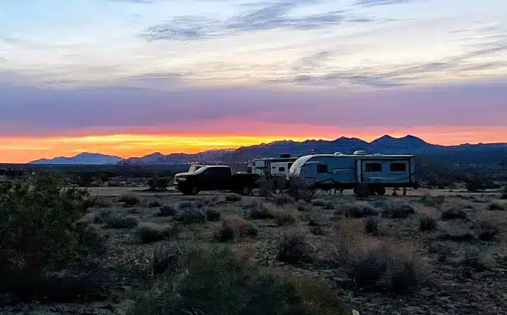 Truck and travel trailer in Joshua Tree National Park boondocking campsite