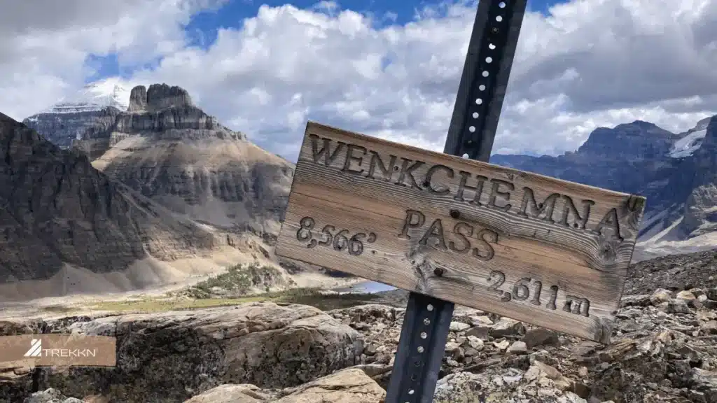 Trail sign along route to Mount Bourgeau with text 'Wenkchema Pass'