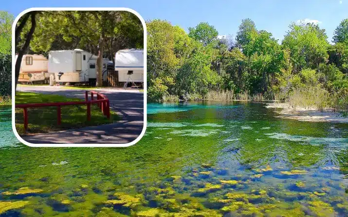 Travel trailers at RV Park and background image of lake